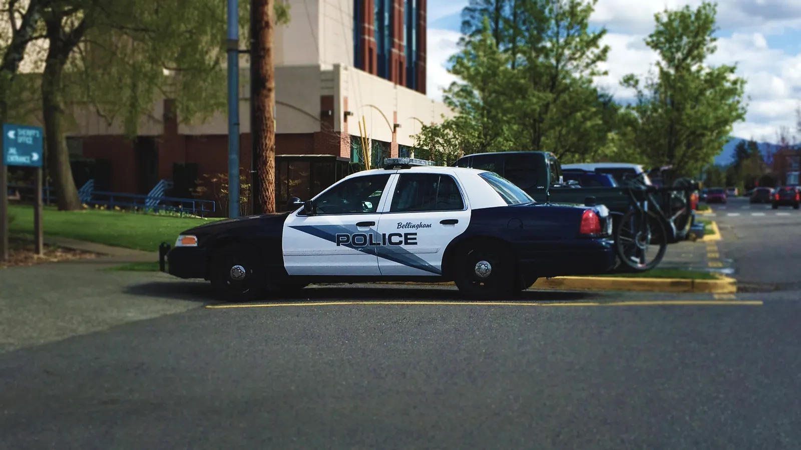A police patrol car parked on a city street